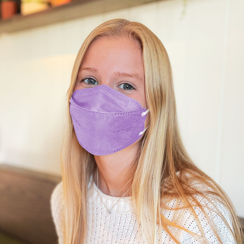 USA Teen Petite Young Woman wearing small grey breatheTeq KN95 purple lavender respirator face mask from Canada