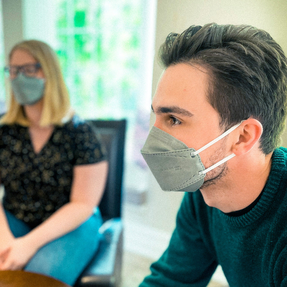 Business people at the office wearing gray KN95 face mask USA