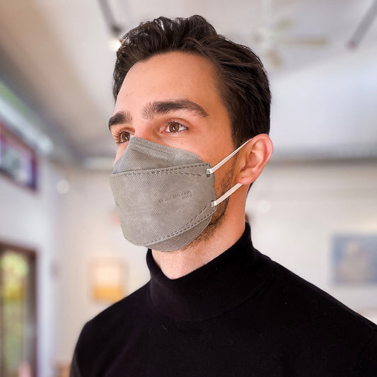 Man wearing breatheTeq grey KN95 gray face mask made in Canada